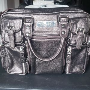 The House of Flynn Dragons egg glitter camera bag